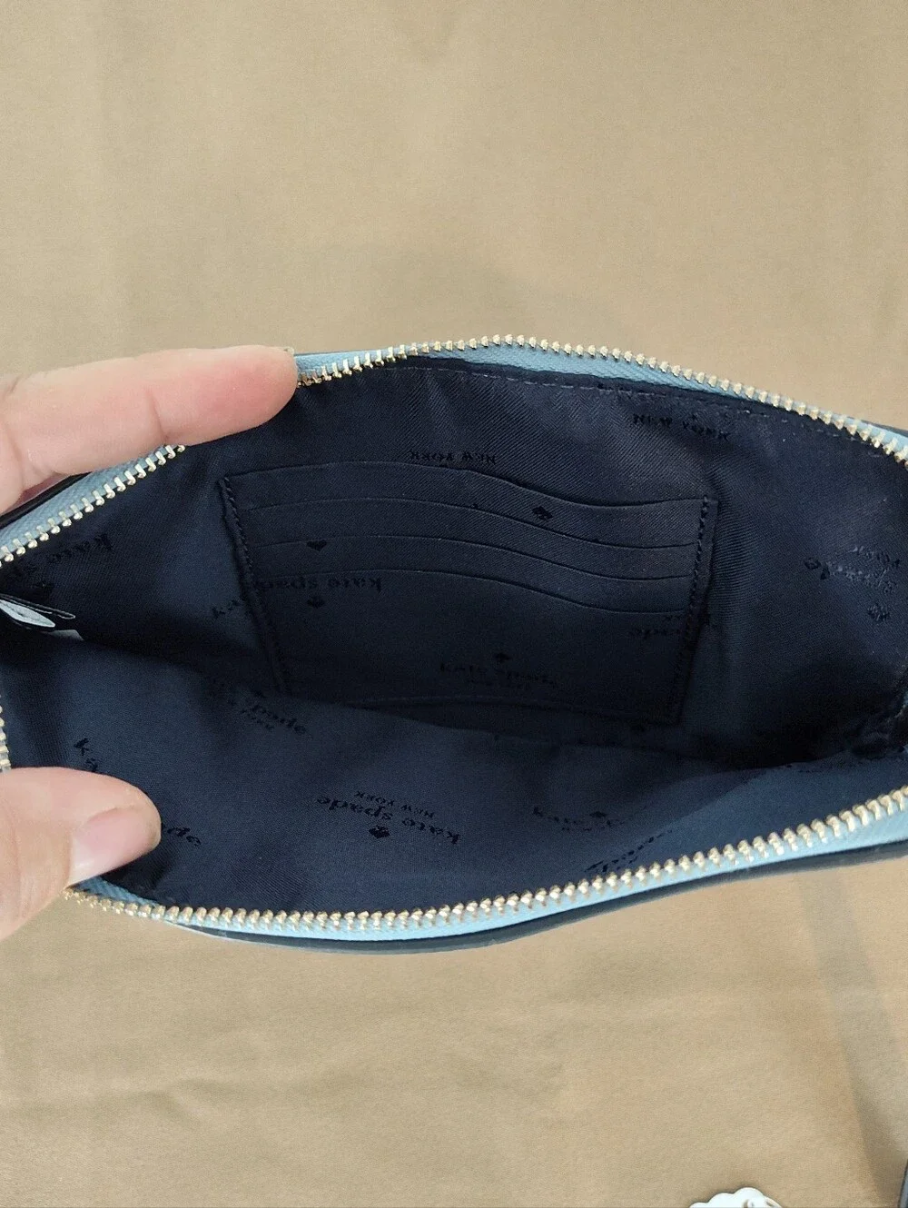 kate spade Cornflower Blue Lucy Wristlet with gold zipper
